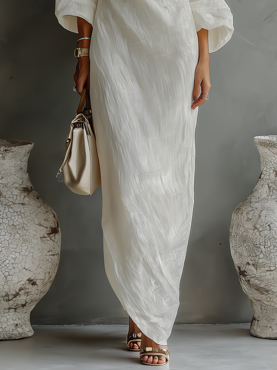 Elegant Flowing Dress in Ivory White with Off-Shoulder