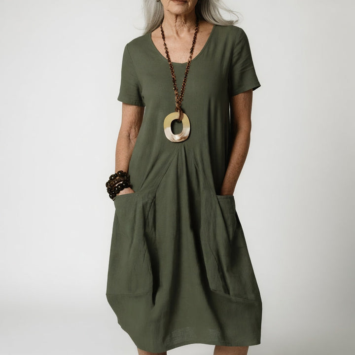 Céline™ — Fluid Dress Flattering Tummy Elegance