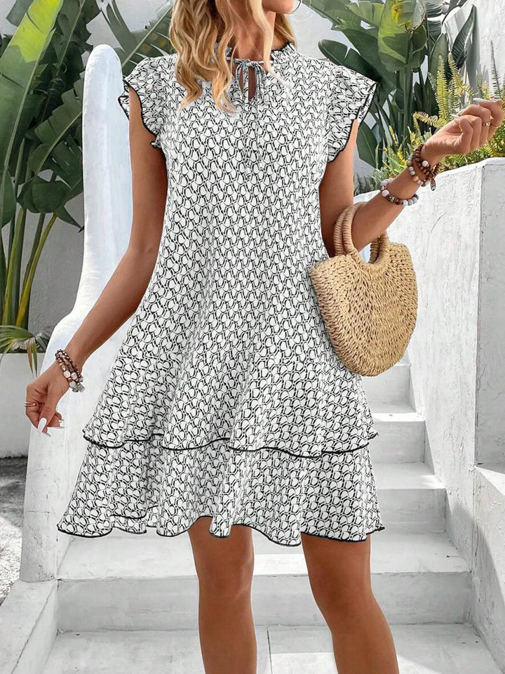 Krest | Robe élégante à fleurs