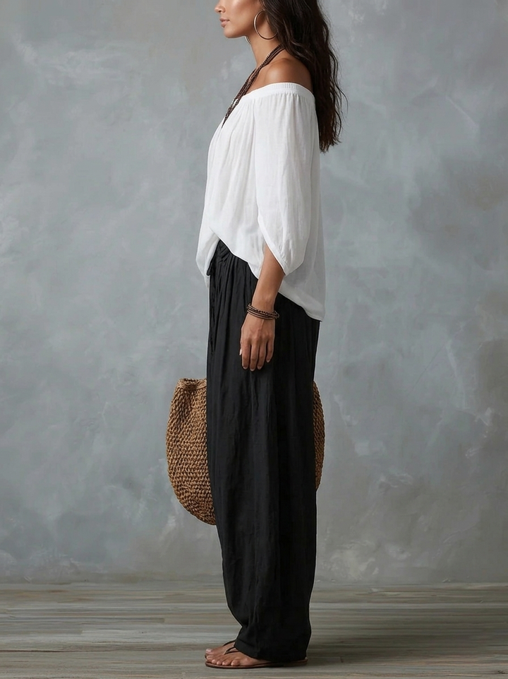 White off-shoulder top and lantern-style flared pants
