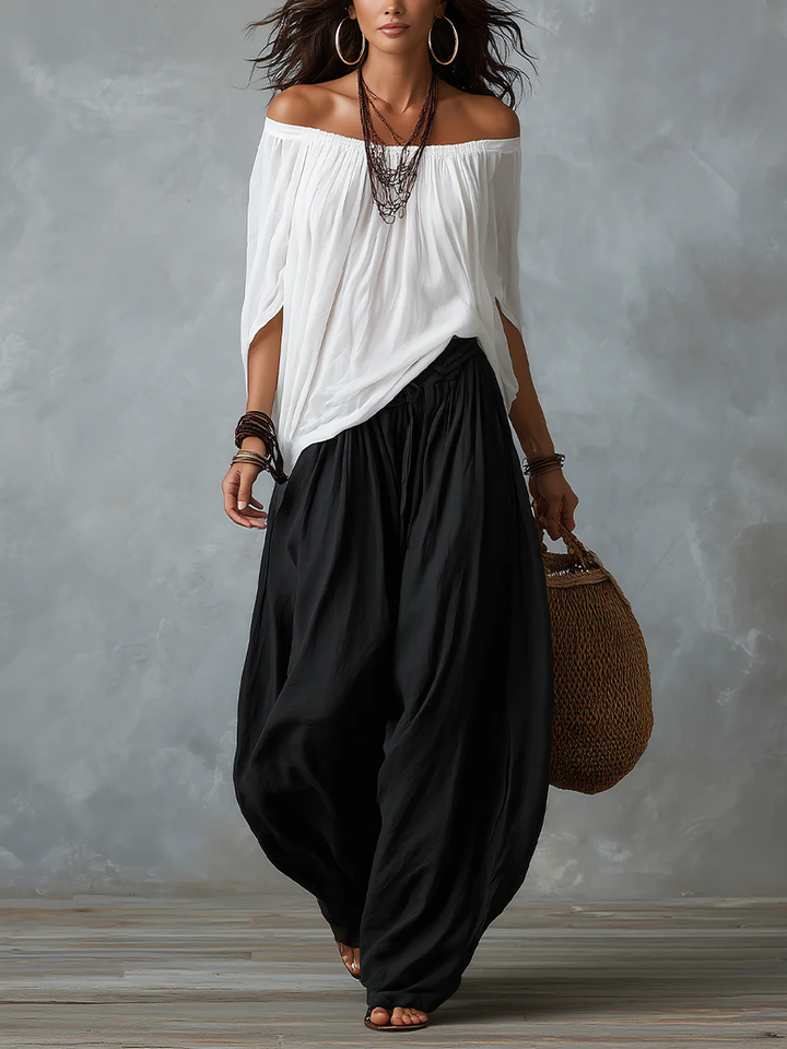 White off-shoulder top and lantern-style flared pants